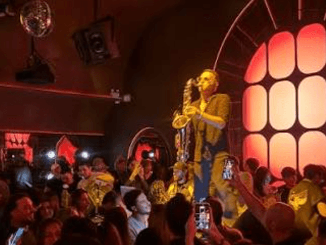 Saxophonist on stage of Mira club Bangkok