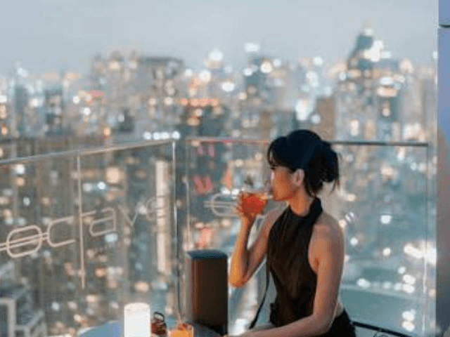 a girl at Octave rooftop bar evening